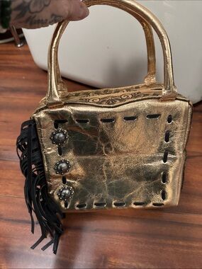 Metallic Gold Mini Top-Handle Bag with Black Fringe